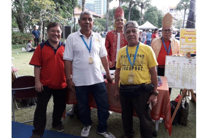 <a href="/assets/9ad7d714-7b31-4b34-ab3c-7bea4f906bbb/Abdul Latiff at MHC event.jpg">Abdul Latiff bin Omar and fellow Banjar sharing their cultural heritage at an event organised by the Malay Heritage Centre</a>